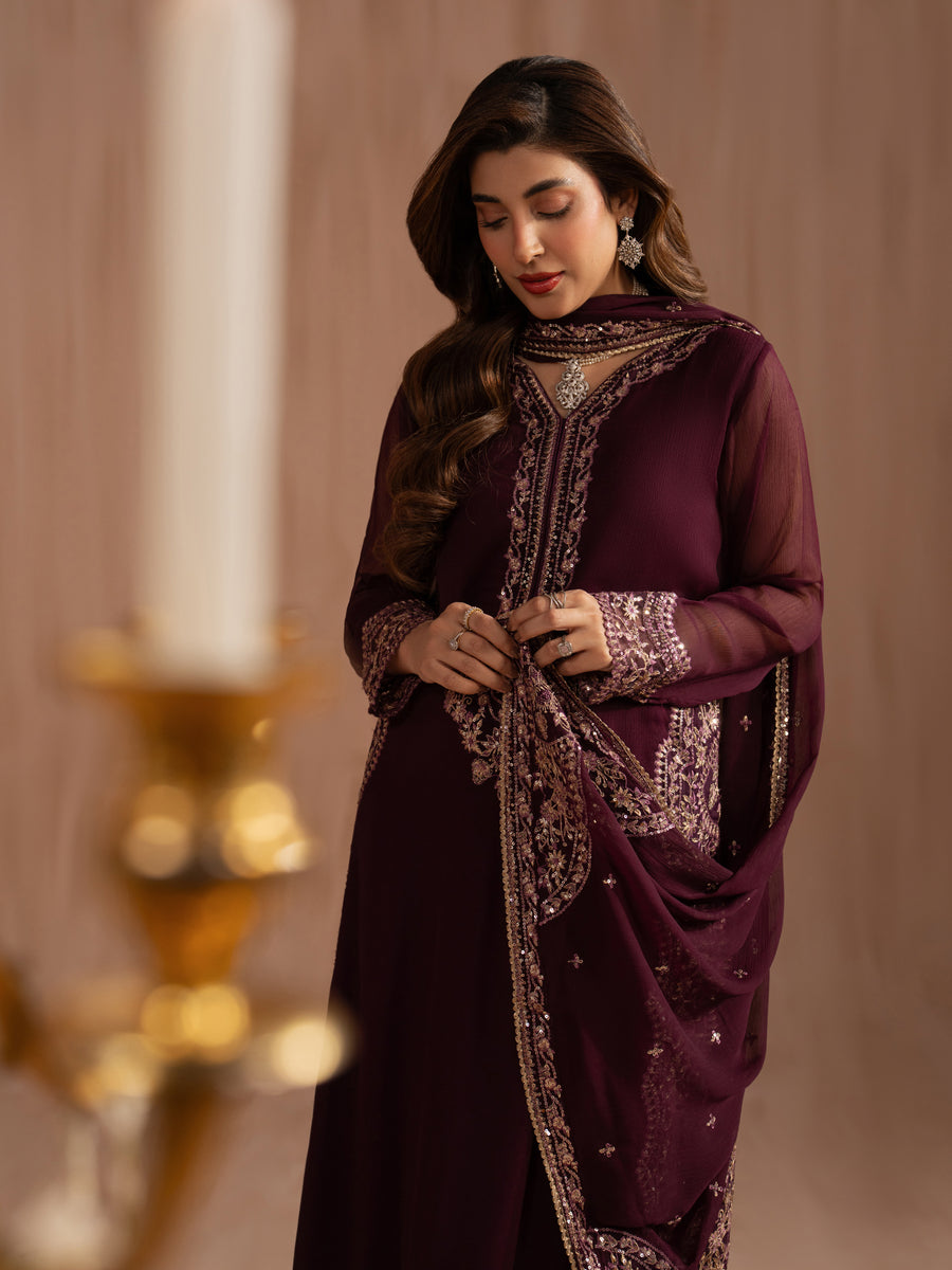 Stitched suit designs featuring chiffon dresses embroidery